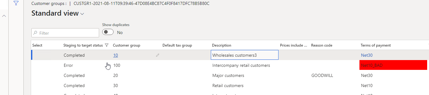 DMF staging records with one row in error and the invalid value highlighted
